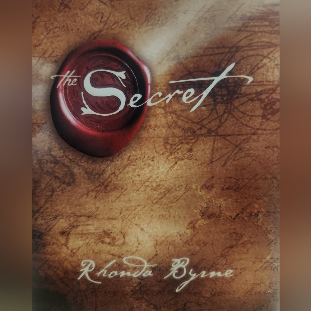 The Secret by - Brown Cover